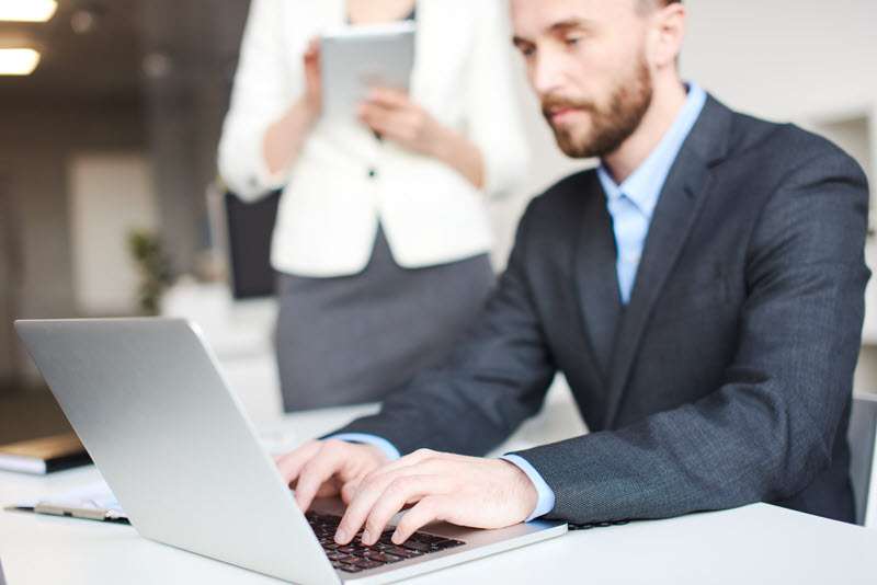 auditor using laptop